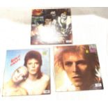 Selection of 3 David Bowie records includes Diamond dogs, Space oddity and Bowie pin ups