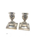 Pair of antique silver candlesticks London silver hallmarks measure height 11.5cm filled bases