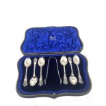 Boxed silver teaspoons & sugar tongs