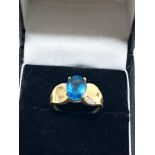 9ct gold blue topaz & diamond dress ring (3.3g)