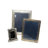 3 silver picture frames largest measures approx 25cm by 19cm
