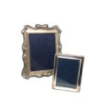 2 silver picture frames largest measures approx 24cm by 20cm m