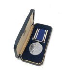 Boxed ER.11 police long service medal to inspector richard scott