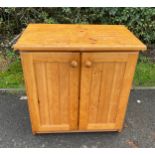 Pine 2 door cupboard measures approx 30 inches tall 29 inches wide b y 18 inches depth