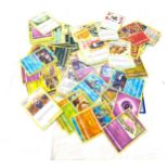 Large selection of collectors cards includes Pokemon cards, Rev halo, Celebrations etc nearly