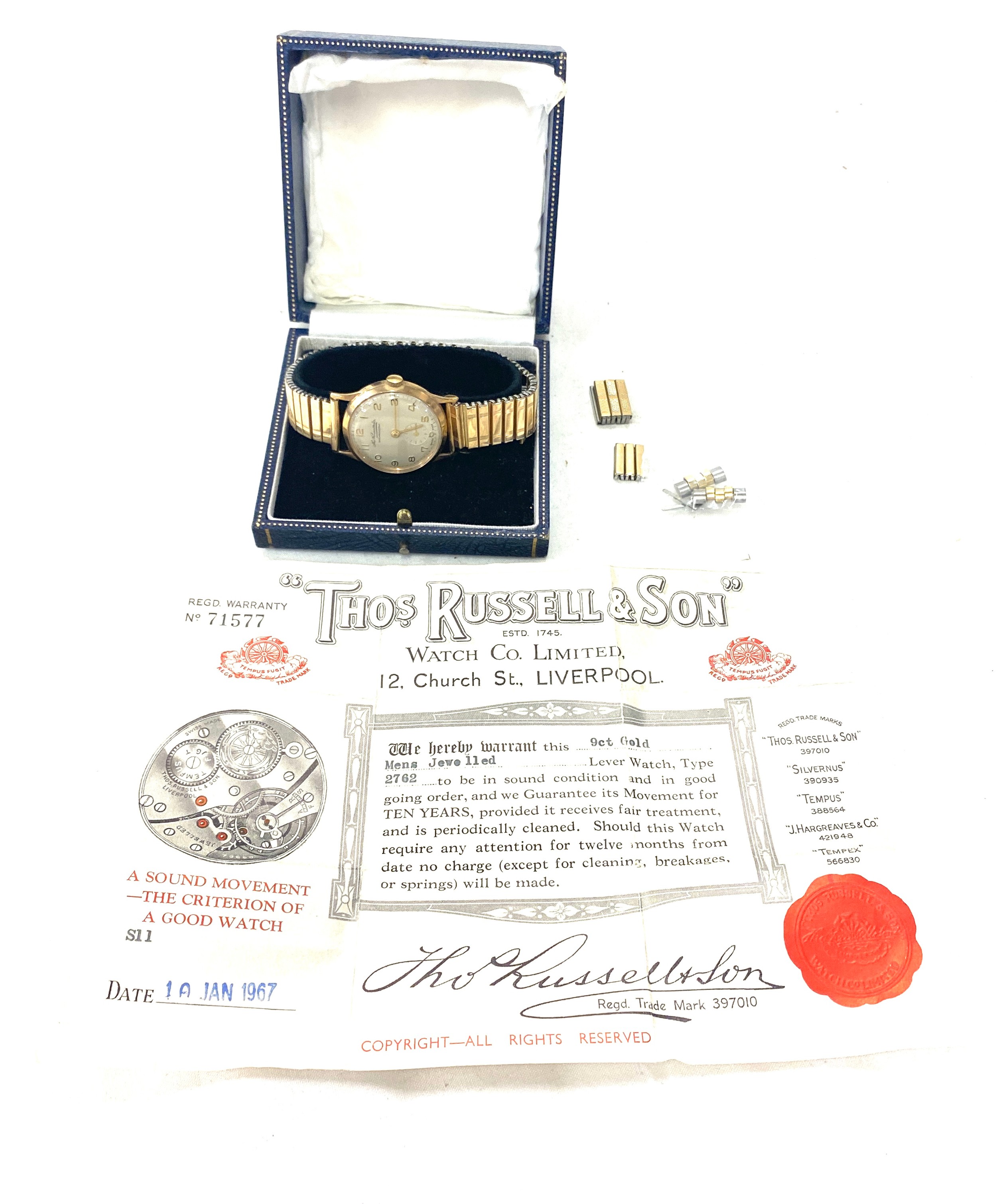 Gents 9ct gold Thos Russell & Son wristwatch, with original warranty certificate, working order,