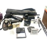 Selection of cameras and camera equipment includes binoculars etc