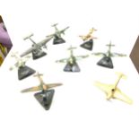 Selection of metal aircraft models on stand includes defence of the reich focke - wulf, Curtis 940