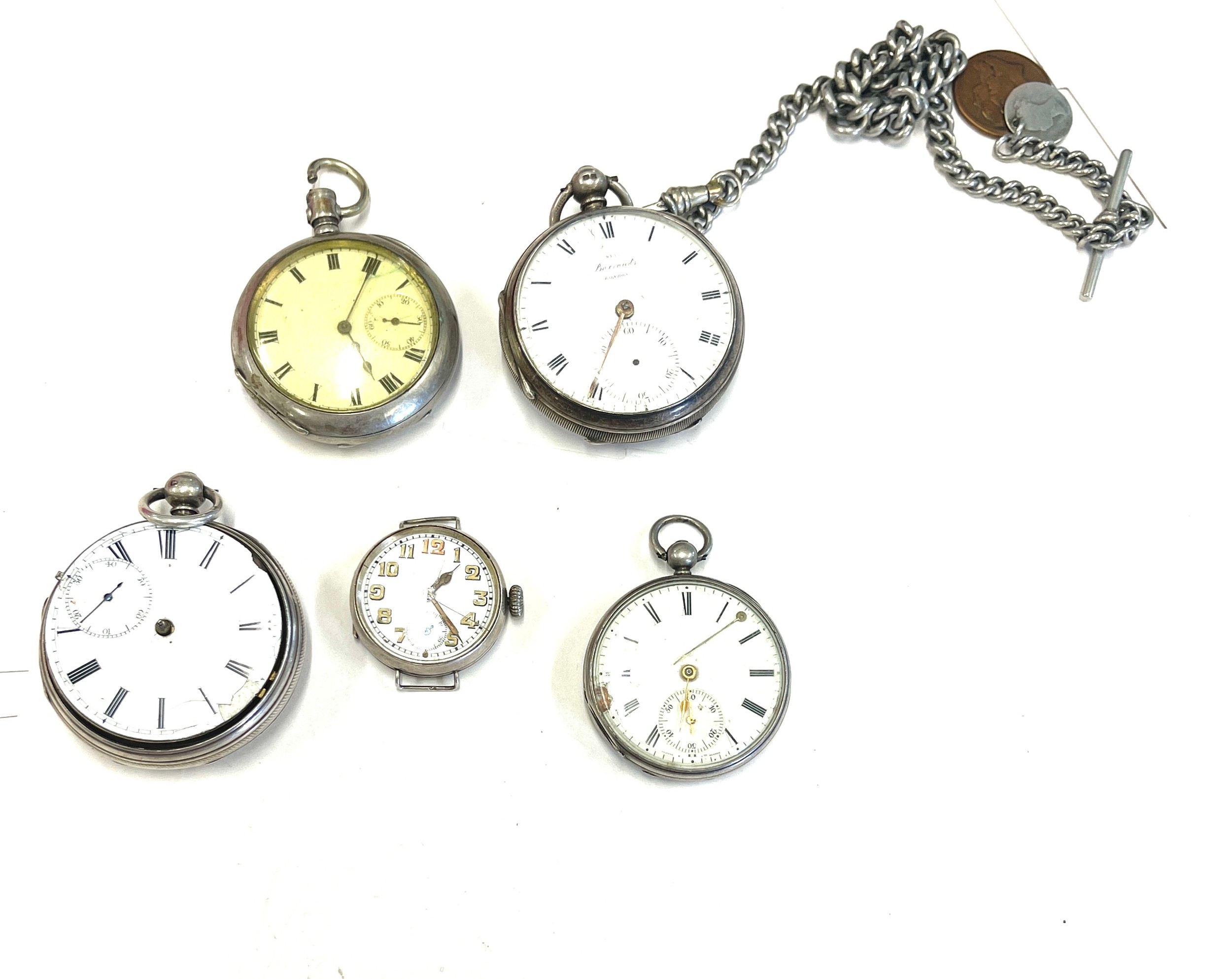 Four silver pocket watches and trench watch, all untested
