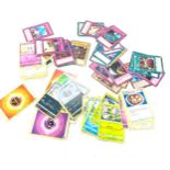 Large selection of collectors cards includes Yu Gi Oh, Pokemon cards etc