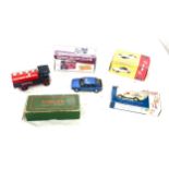 Selection of boxed and unboxed model cars includes great British buses, days gone etc