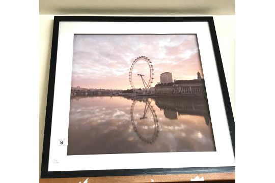 Framed London eye print measures approx 23 inches by 23.5 inches