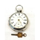 Silver pocket watch hallmark for Chester 1901 with its key and working, hand loose