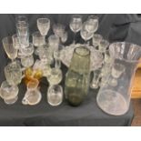 Large selection of glassware includes vases, bowls, wine glasses etc