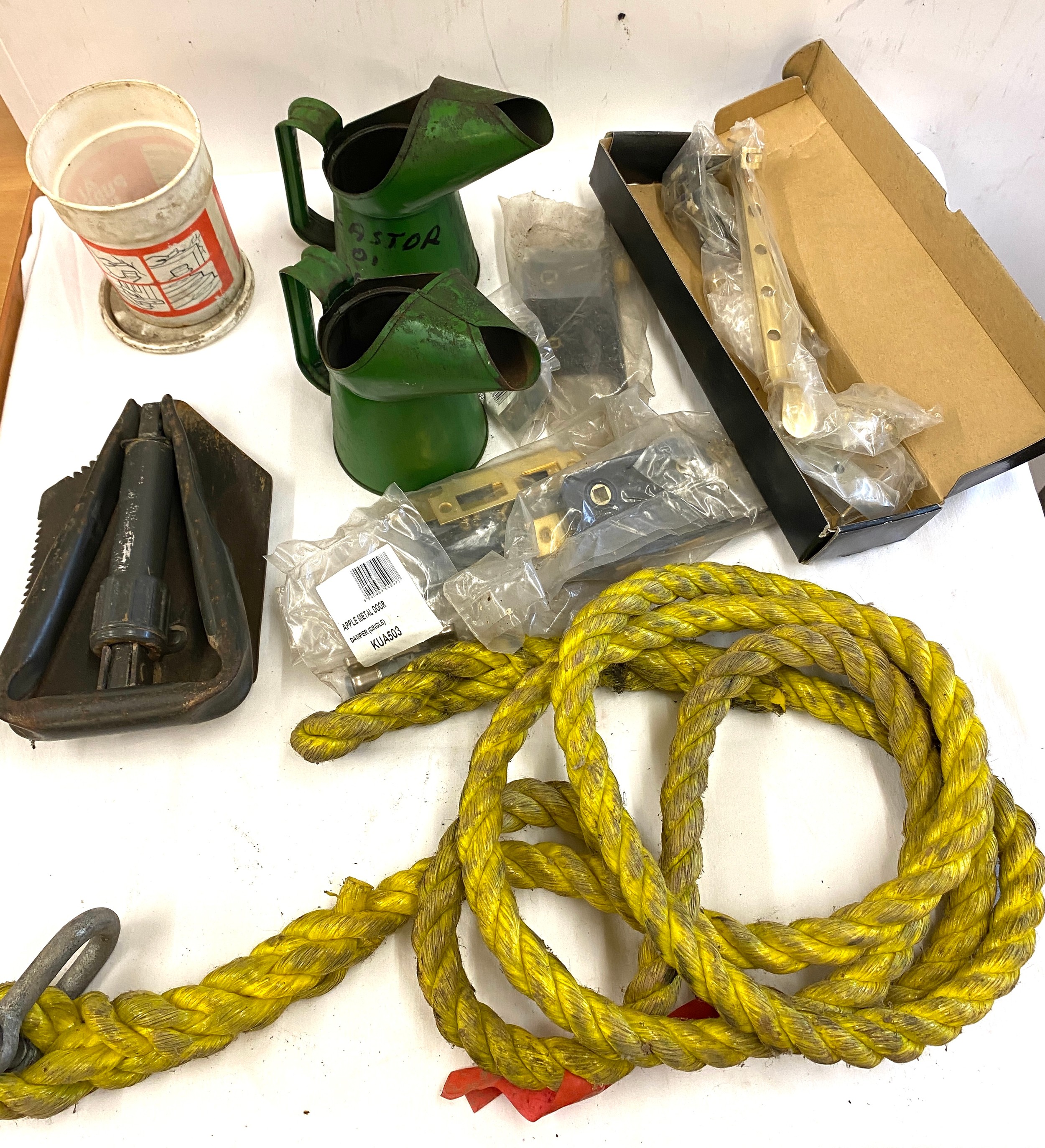 Box of miscellaneous to include: tow rope, folding shovel, oil jugs, nuts and bolts etc