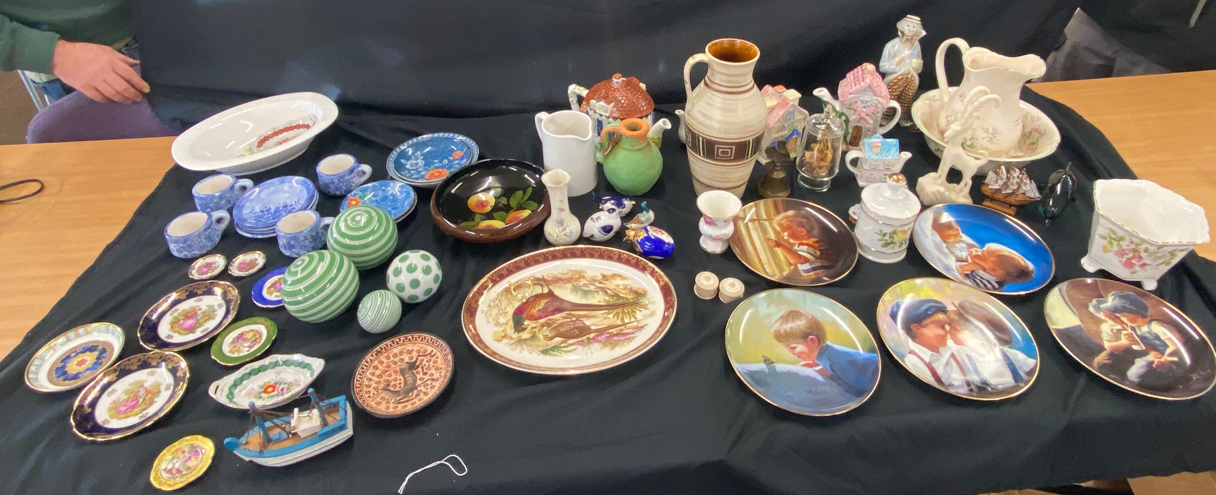 Large selection of assorted pottery to include collectors plates, vases, teapots etc