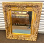 Large vintage ornate gilt framed mirror measures approx 39 inches tall 33 inches wide