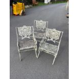 Three vintage iron garden chairs