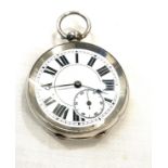 Open faced silver pocket watch in working order