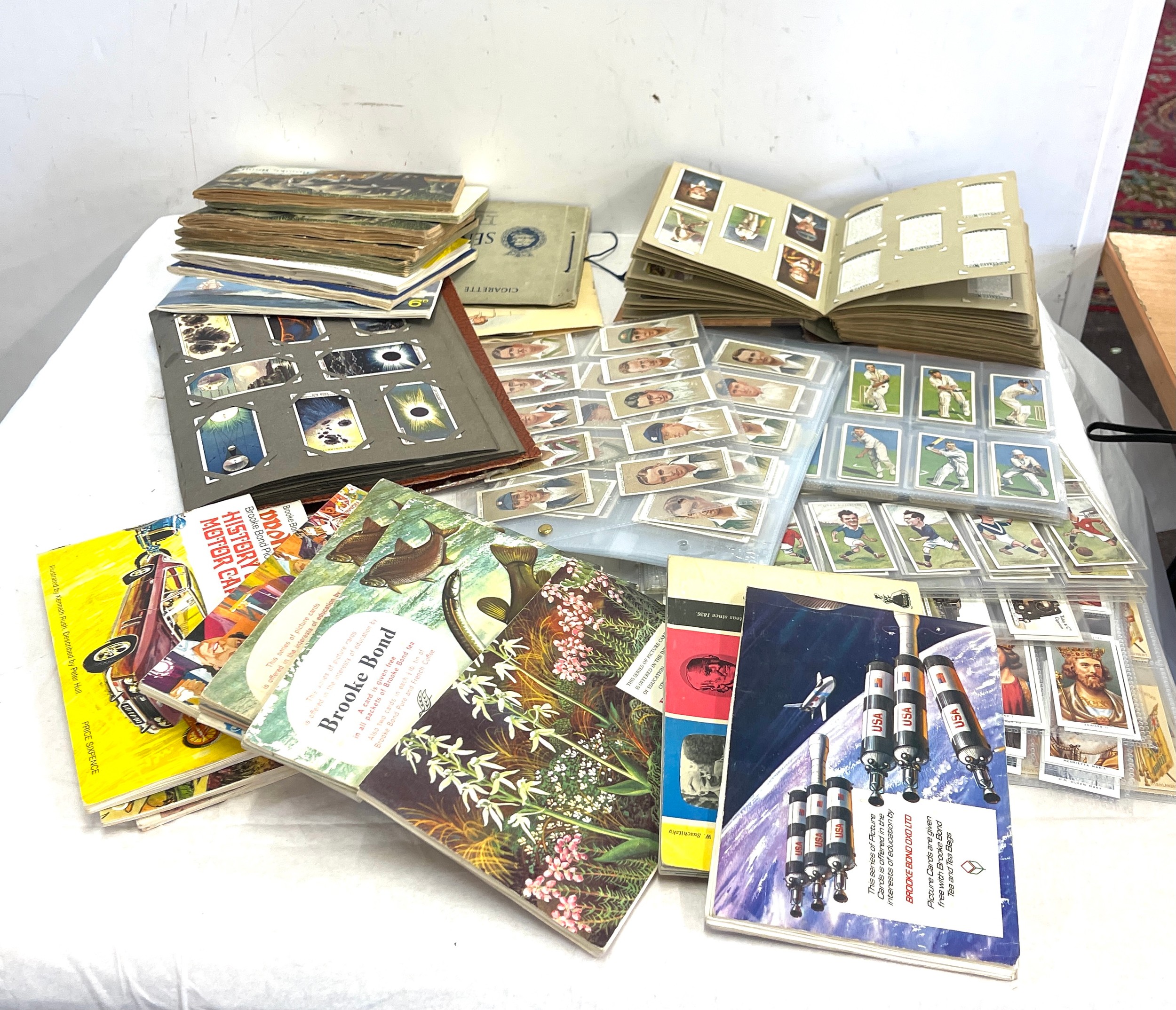 Selection of assorted cigarette cards to include Wills, Players etc