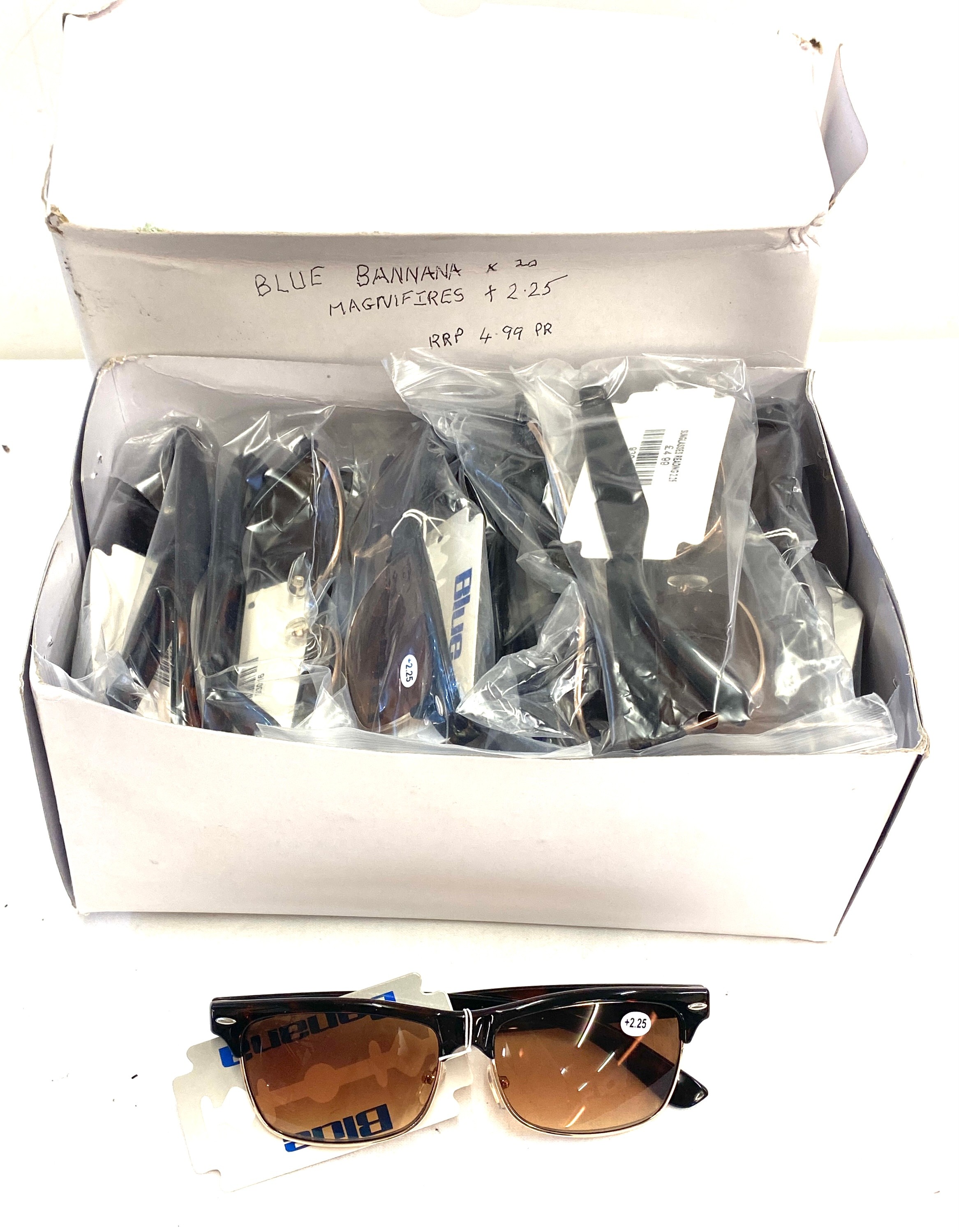 Selection of new in packaging Blue banana magnifying sunglasses