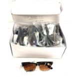 Selection of new in packaging Blue banana magnifying sunglasses