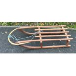 Vintage wooden sledge measures approx 44 inches high by 16 wide