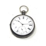 silver open face pocket watch the watch is ticking