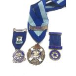 3 silver rotary club medals