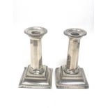 Pair of antique silver candlesticks London silver hallmarks measure height 13.5cm