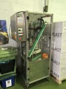 Cap Coder rotating fixture and cabinet capping machine