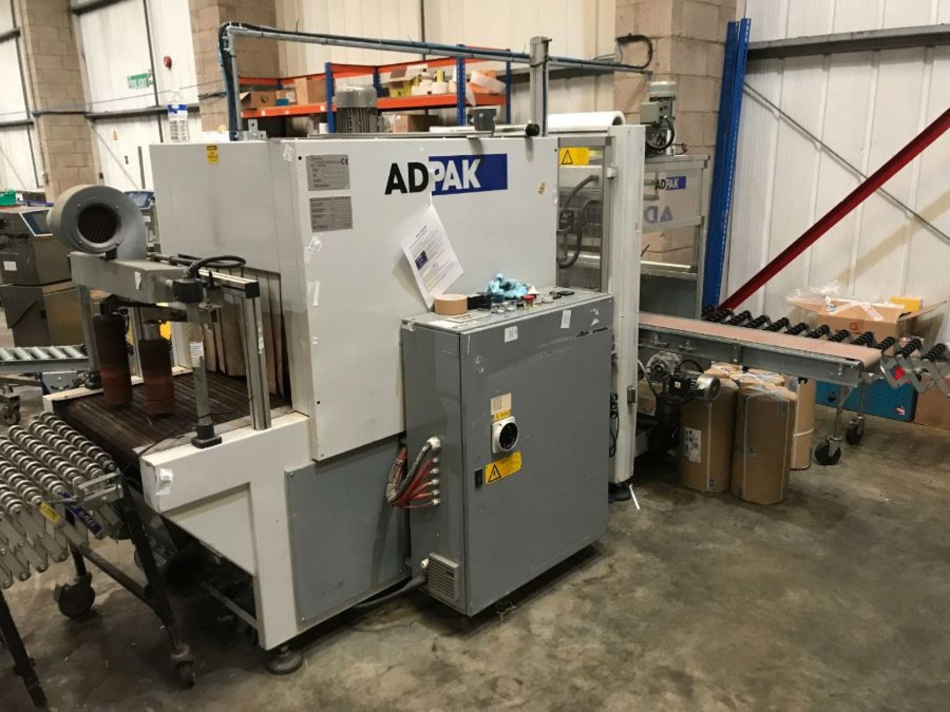 Adpak Uniblock 712 NO film overwrapper and shrink tunnel (2006)