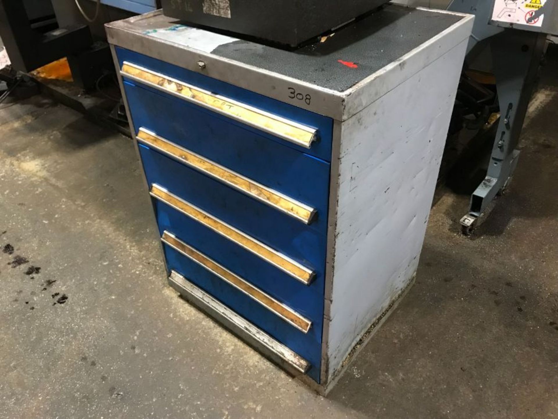 Tool cabinet and turning contents