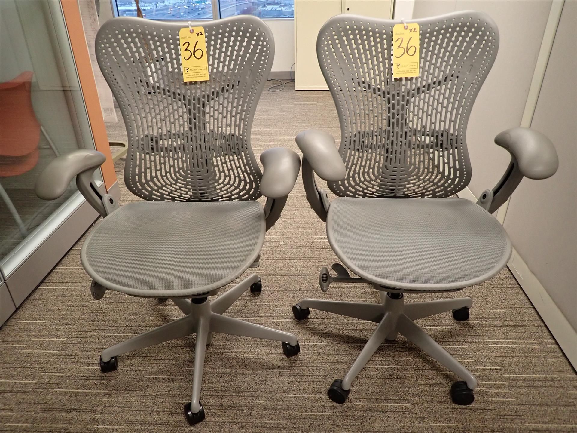 Herman Miller Mirra task chairs; adjustable height, arms, lumbar support, tilt seat and back,