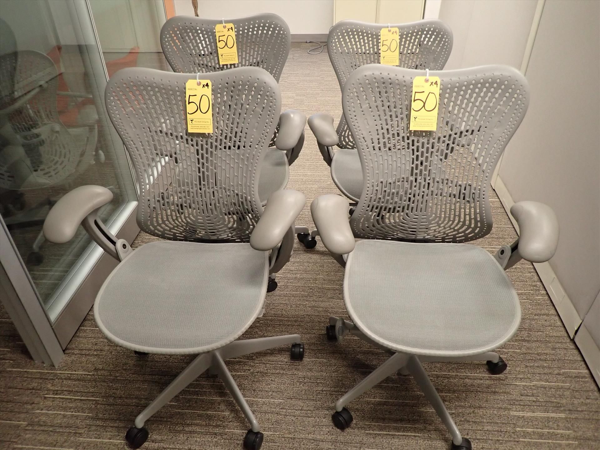 Herman Miller Mirra task chairs; adjustable height, arms, lumbar support, tilt seat and back,