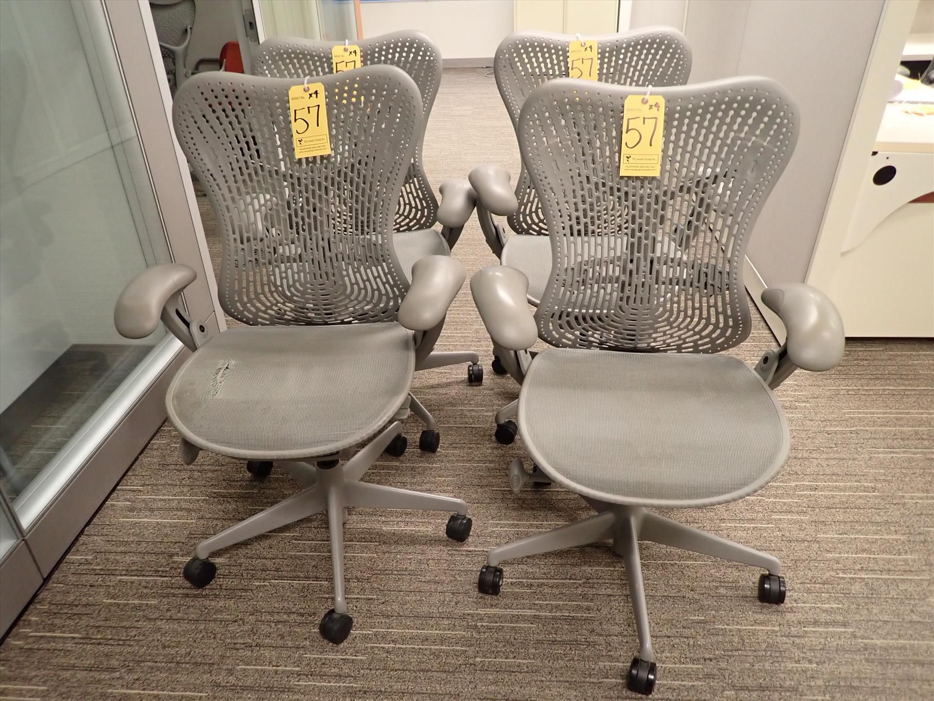 Herman Miller Mirra task chairs; adjustable height, arms, lumbar support, tilt seat and back,