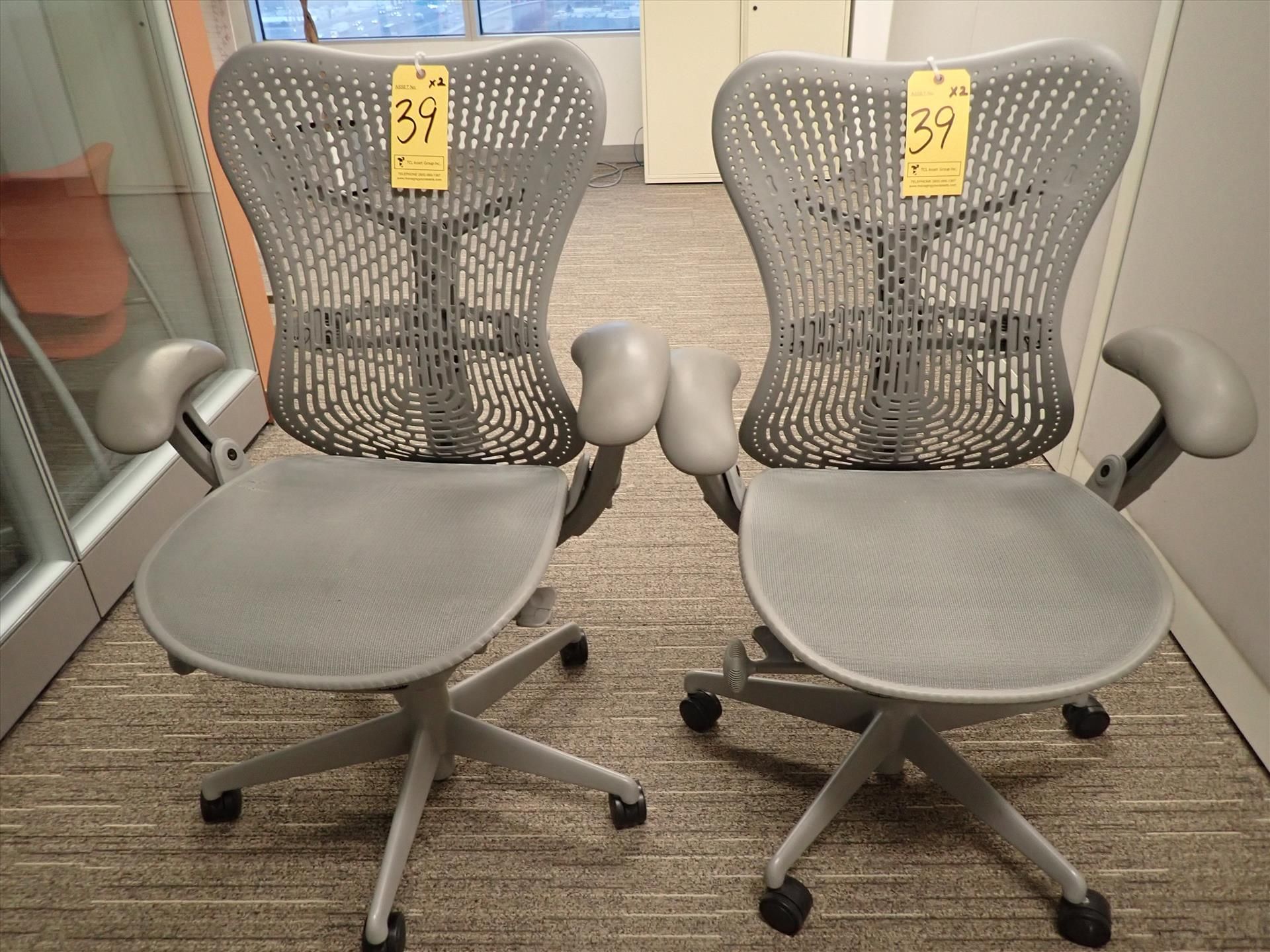 Herman Miller Mirra task chairs; adjustable height, arms, lumbar support, tilt seat and back,