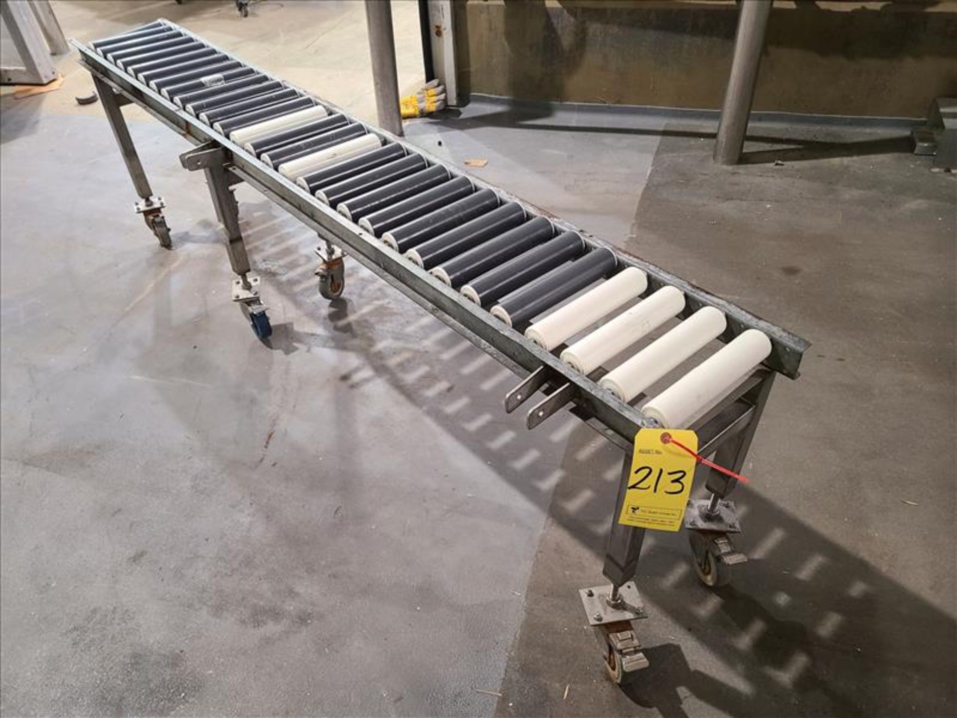 Roller conveyor, 88 in. x 10 in., casters