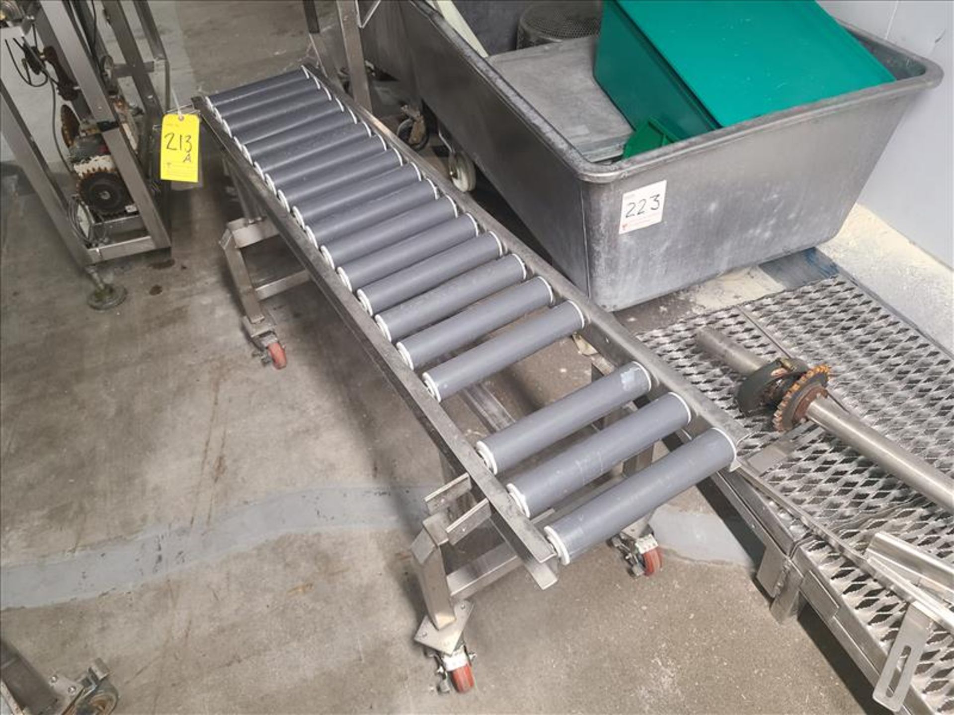 Roller conveyor, 58 in. x 10 in., casters