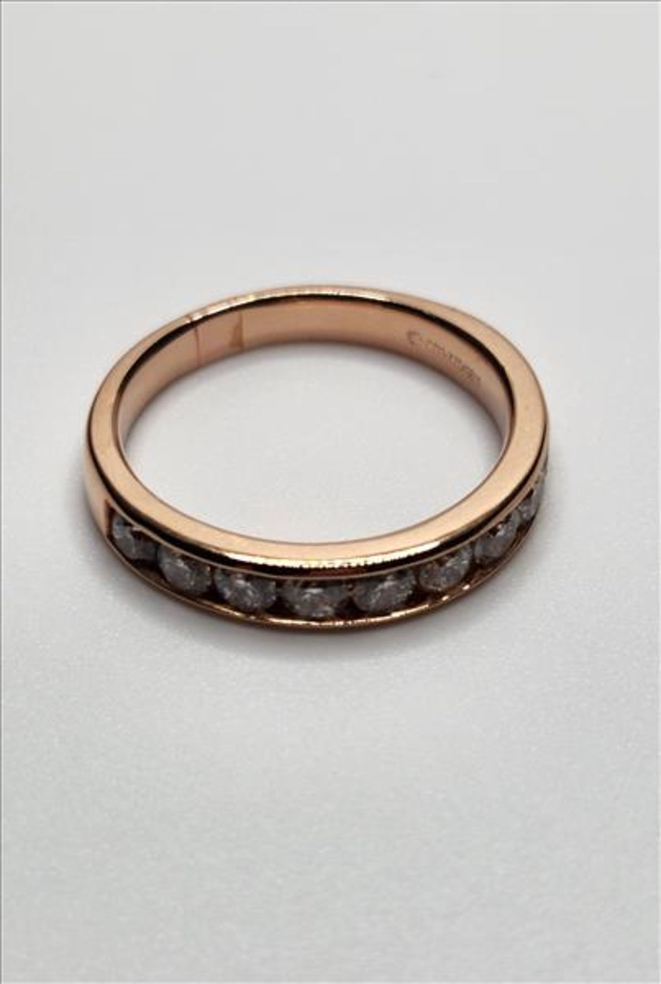 One lady’s stamped and tested 14kt pink gold Arctic Brilliance trademark Canadian Diamond ring (
