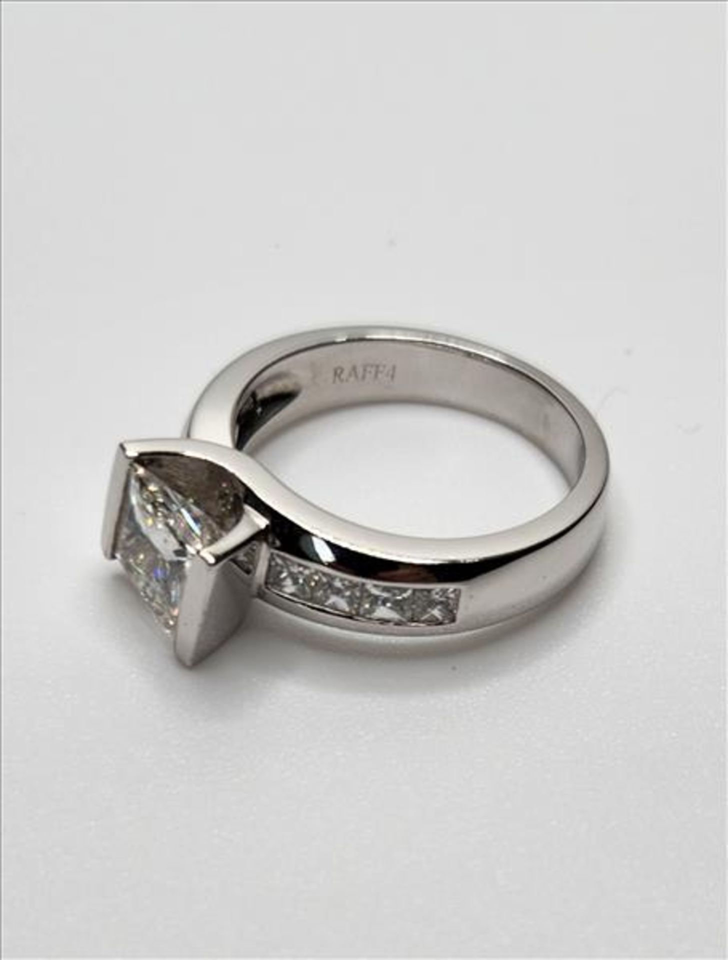 One lady’s stamped RAFP4 and tested 14kt white gold diamond ring by Michael Hill. Contained at the - Image 5 of 7
