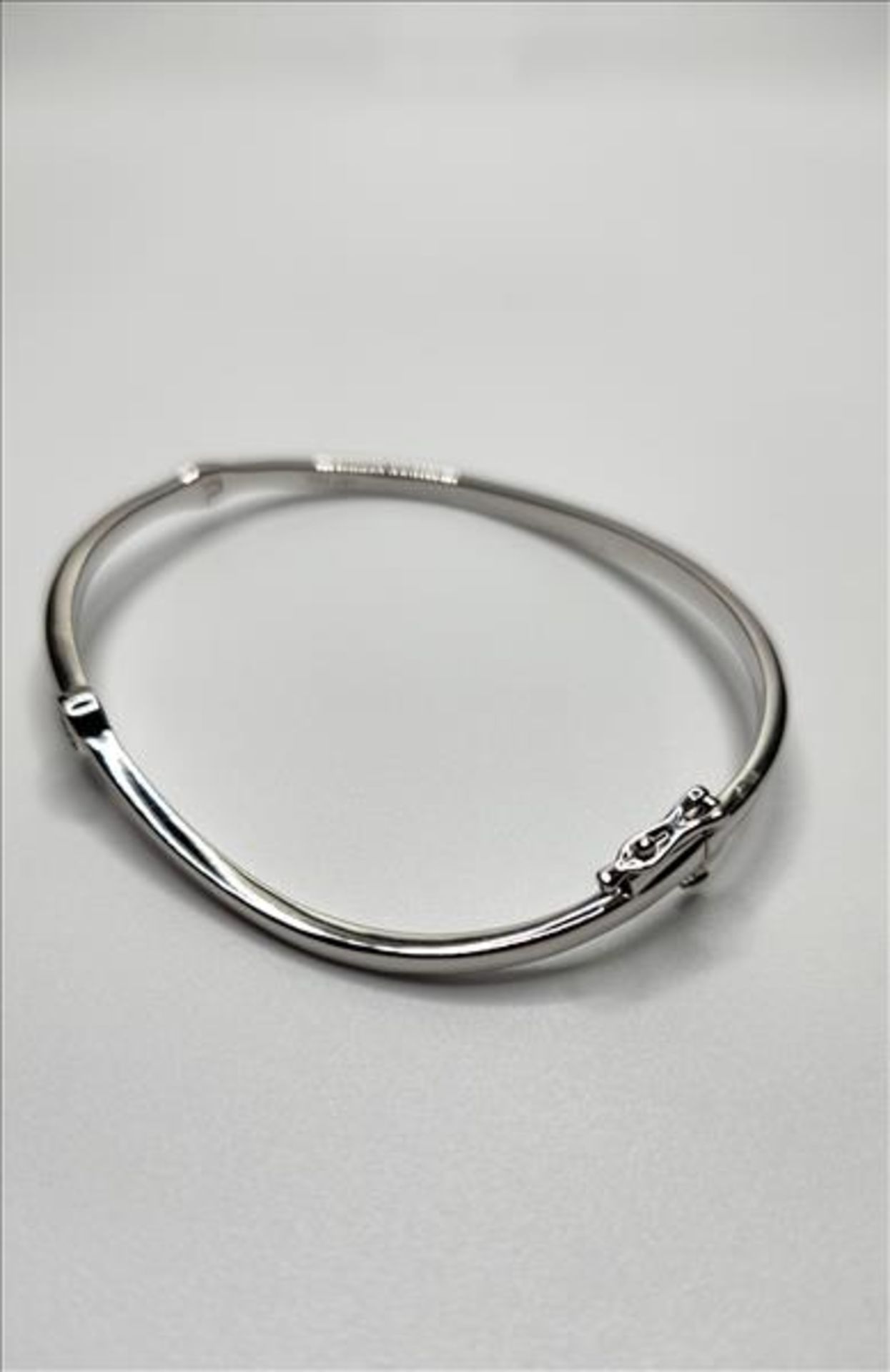 One lady’s stamped JST and tested 925 (sterling silver) diamond solitaire curved bangle. Also - Image 2 of 7