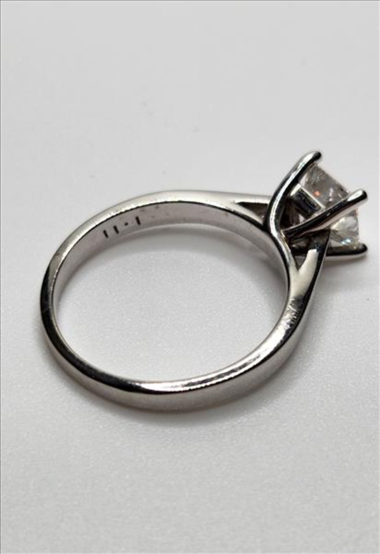 One lady’s stamped and tested 14kt Zp diamond solitaire ring. Contained at the centre is one 8. - Image 6 of 11