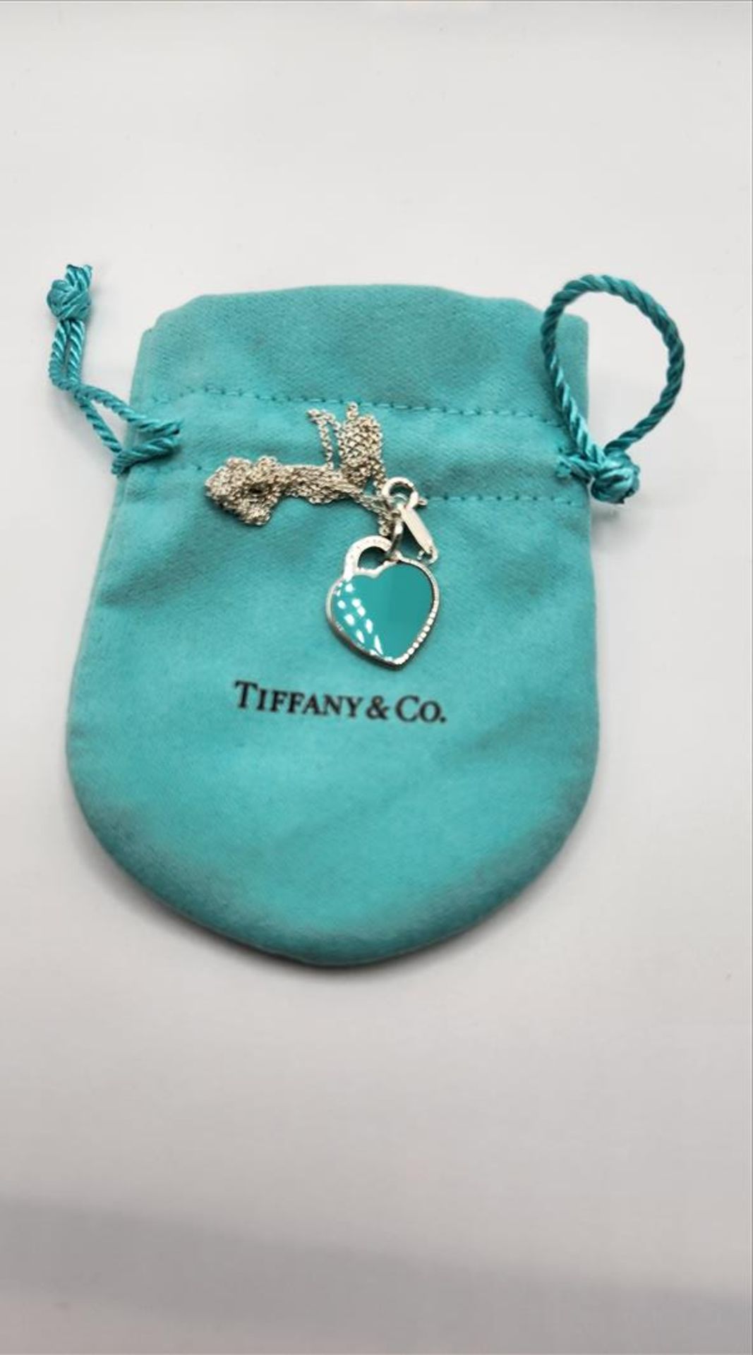 One lady’s stamped “Please Return to Tiffany and Co. new York 925” turquoise blue enamel heart - Image 2 of 6