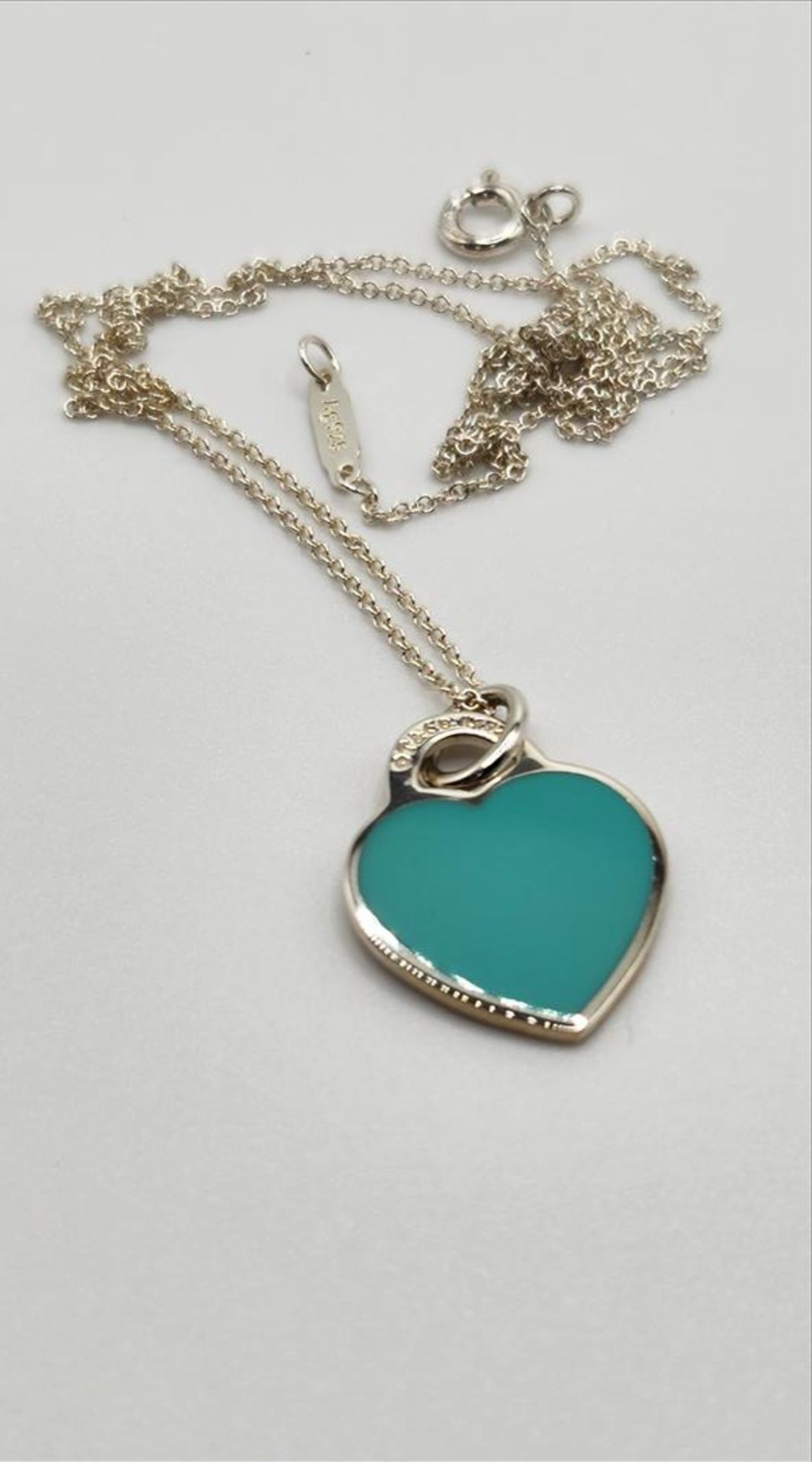 One lady’s stamped “Please Return to Tiffany and Co. new York 925” turquoise blue enamel heart - Image 3 of 6