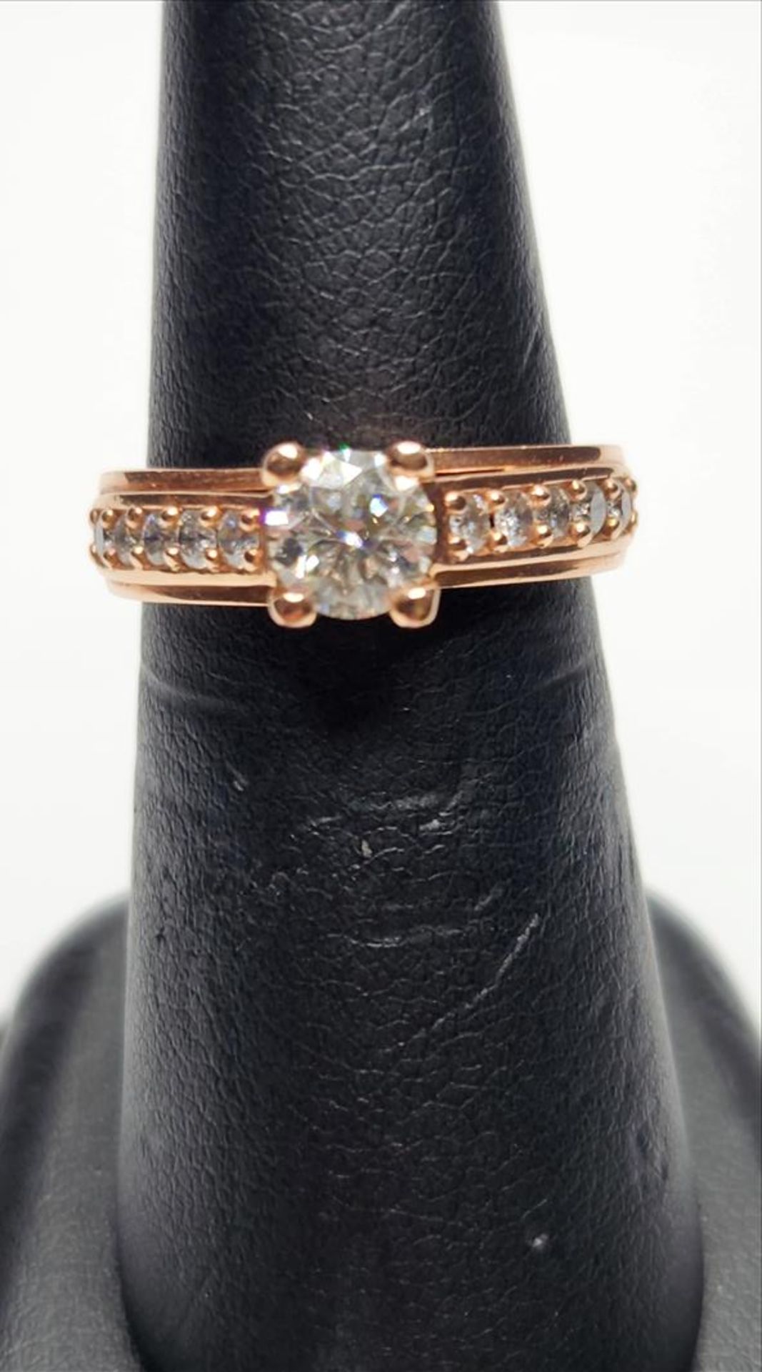 One lady’s stamped and tested 14kt pink gold diamond engagement ring. Contained at the centre is one - Image 5 of 7