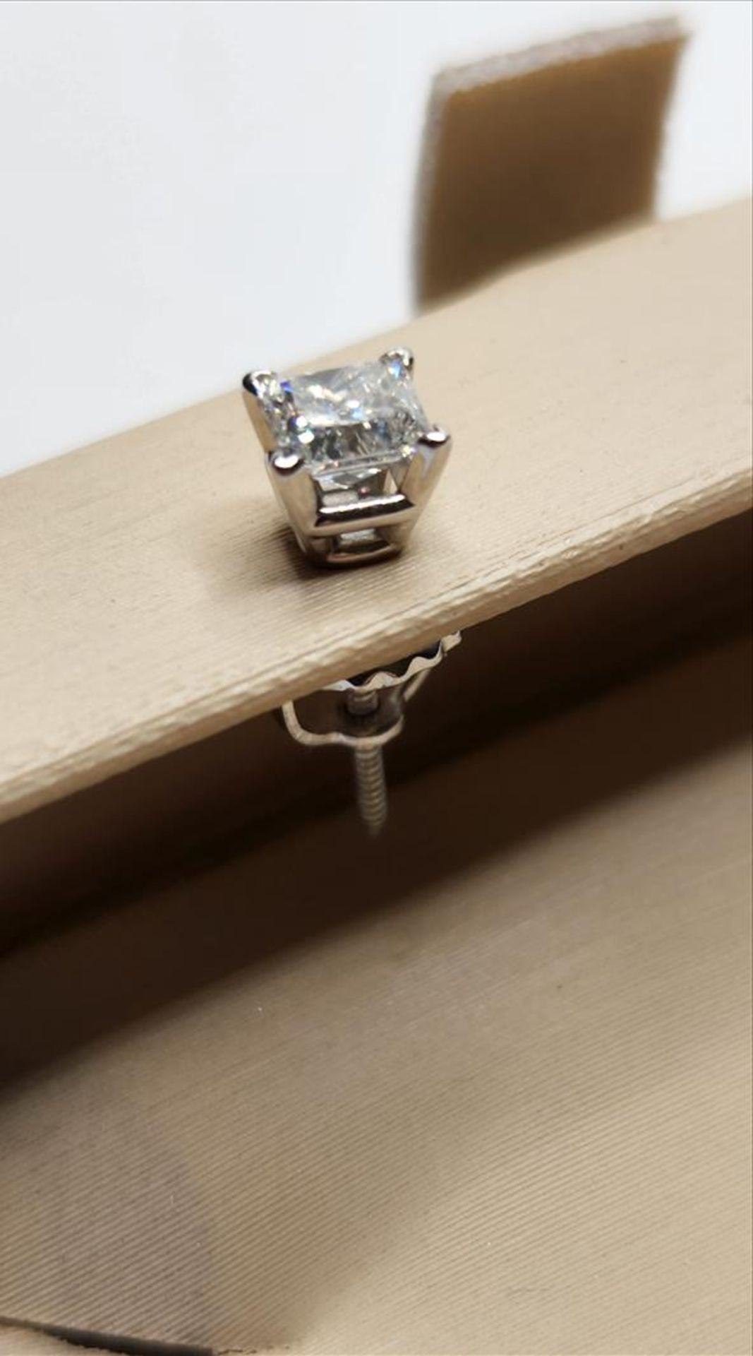 One pair of lady’s stamped and tested 14kt white gold diamond stud earrings. Contained within each - Image 3 of 6