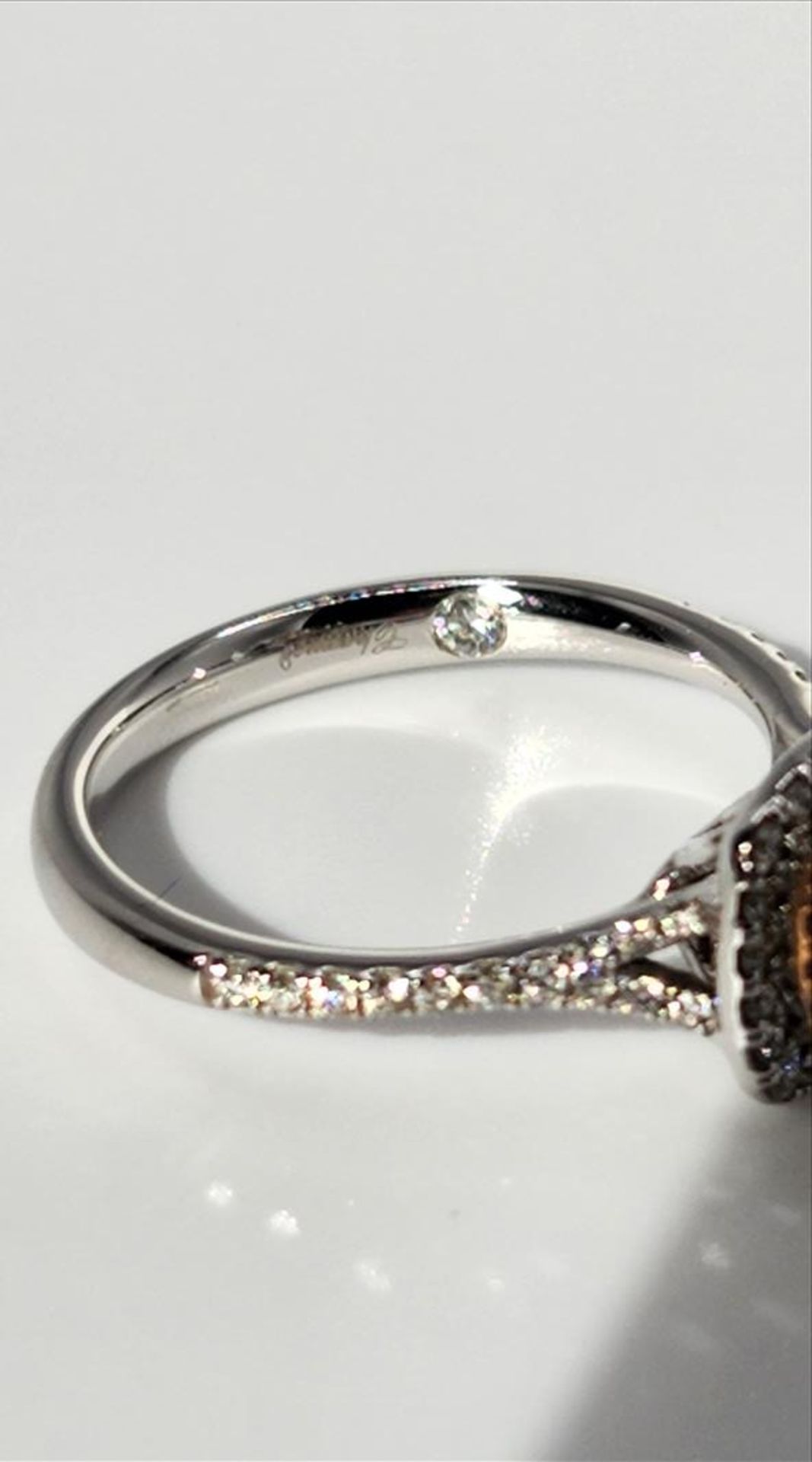 One lady’s stamped and tested 14kt white and pink gold diamond ring trademarked “Charmed” design - Image 3 of 9