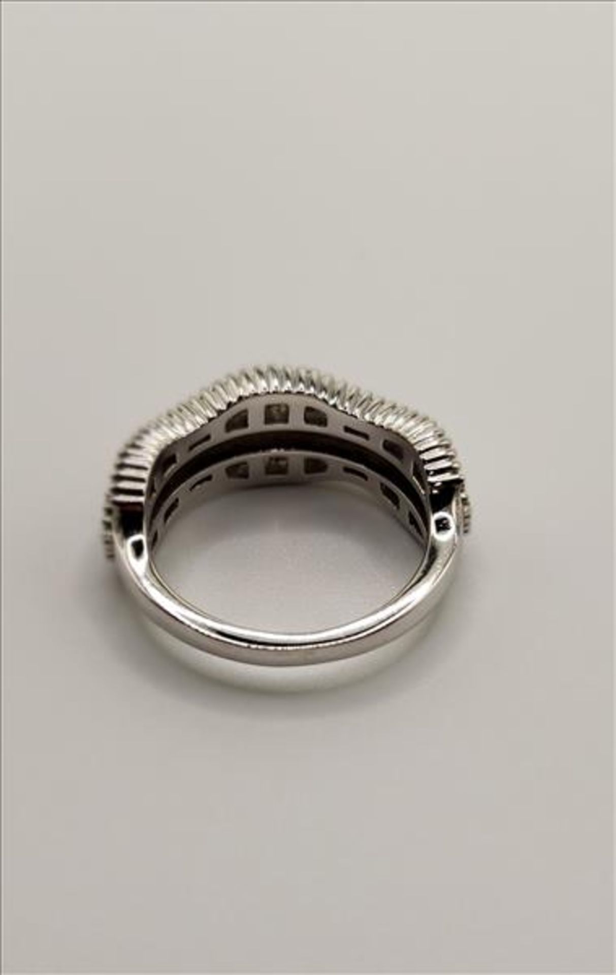 One lady’s stamped JST and tested 10kt white gold diamond ring. Also stamped is People Jewellers “ - Image 2 of 5