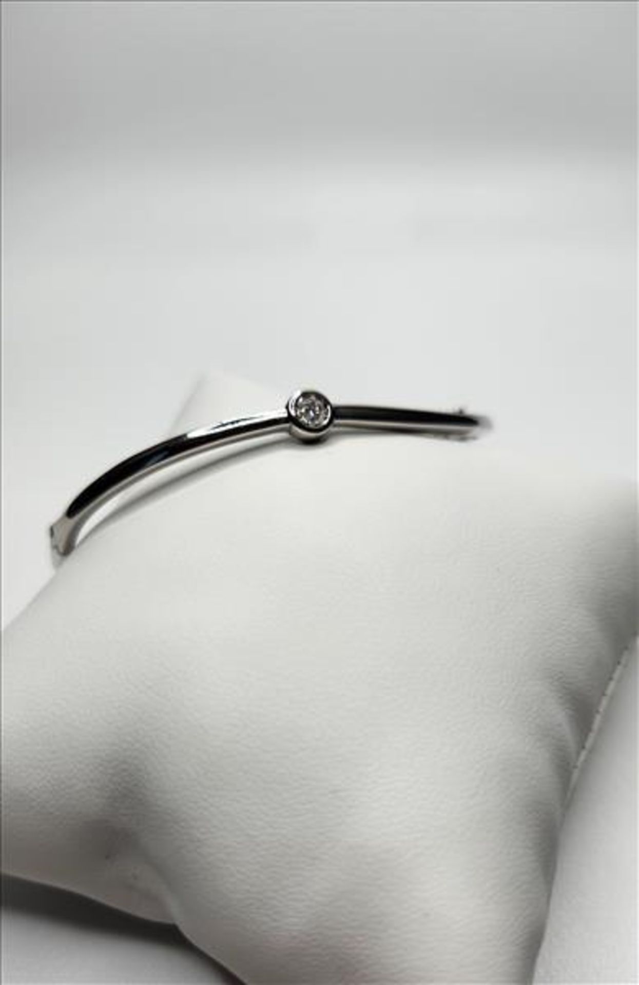 One lady’s stamped JST and tested 925 (sterling silver) diamond solitaire curved bangle. Also - Image 4 of 7